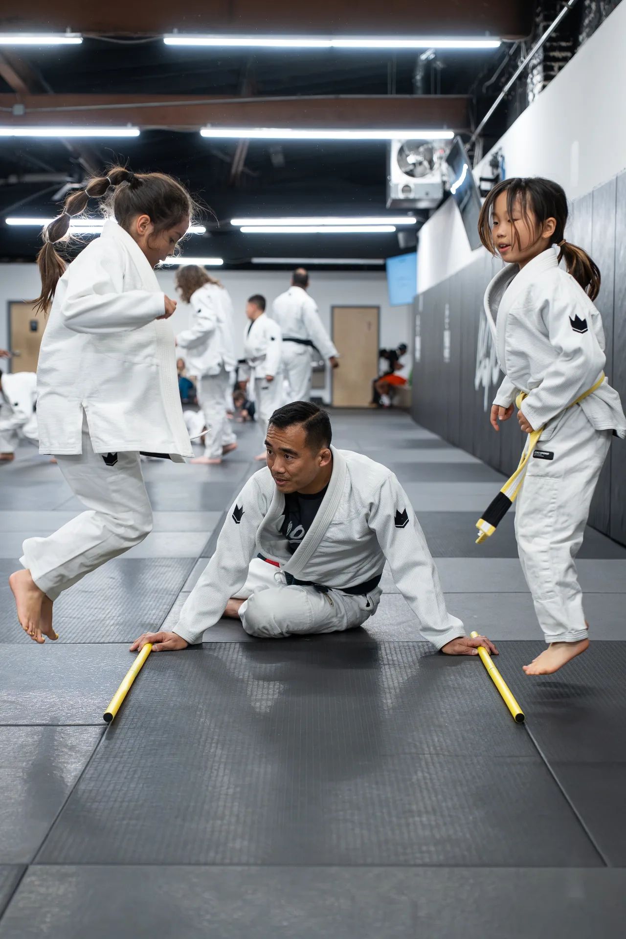 Matt Rong coaching kids jiu jitsu at Logic Philadelphia