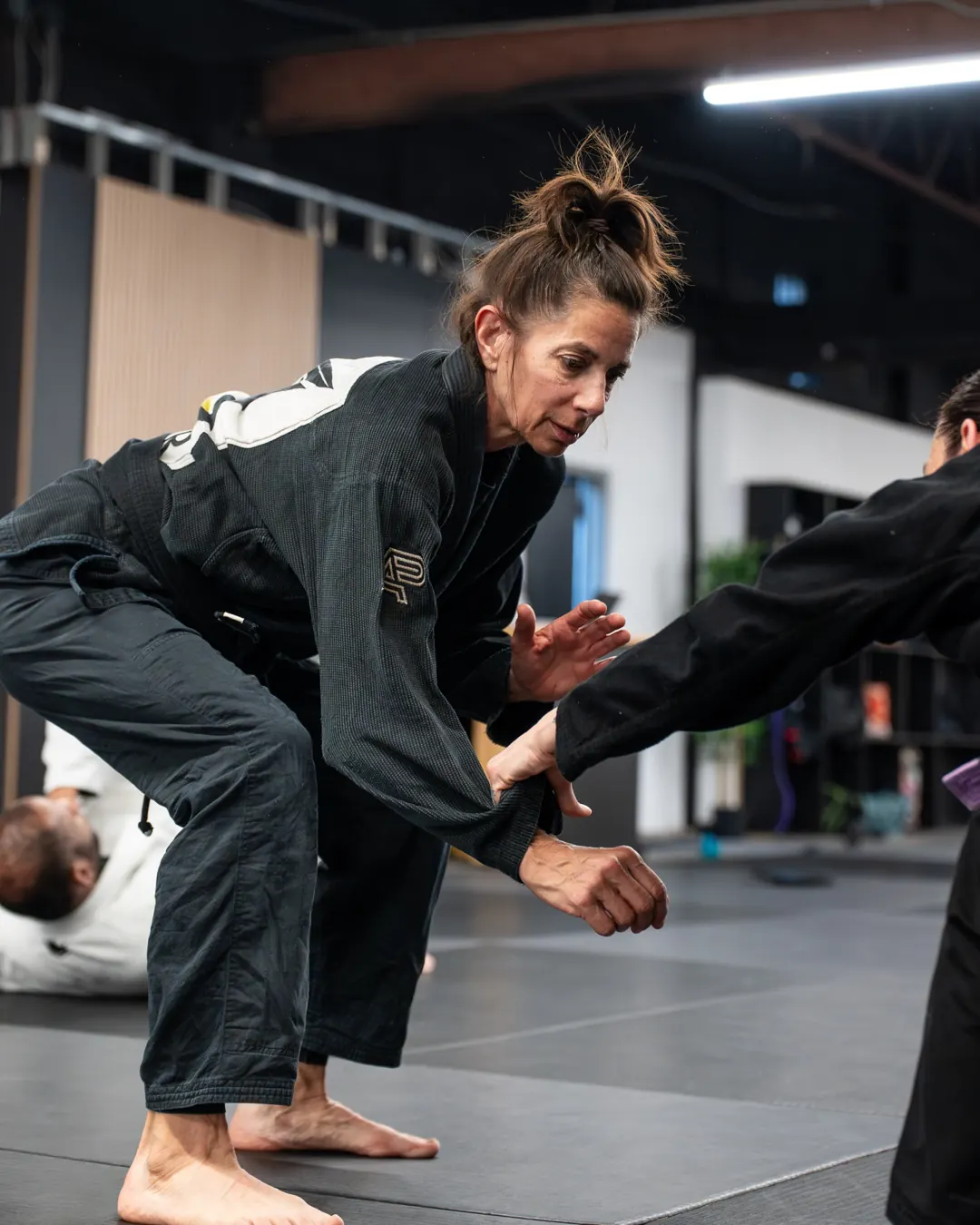 Logic instructor Gina Mancuso drilling with a partner