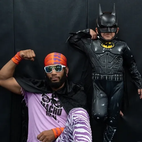 Markee with a kids member at Logic's Halloween party